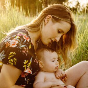 Image of a mother and baby in a field